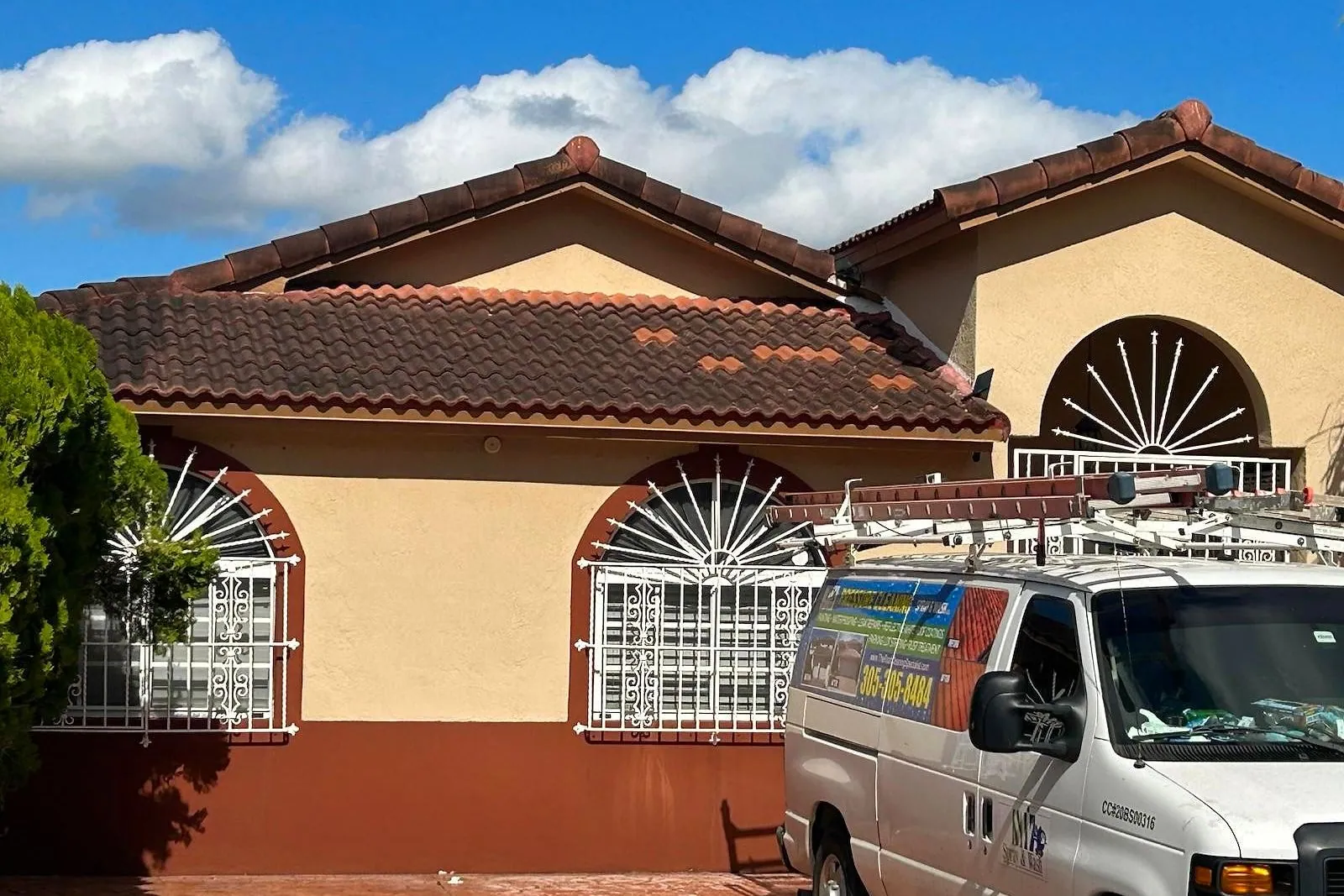 A 30 year old barrel tile roof before and after cleaning — before