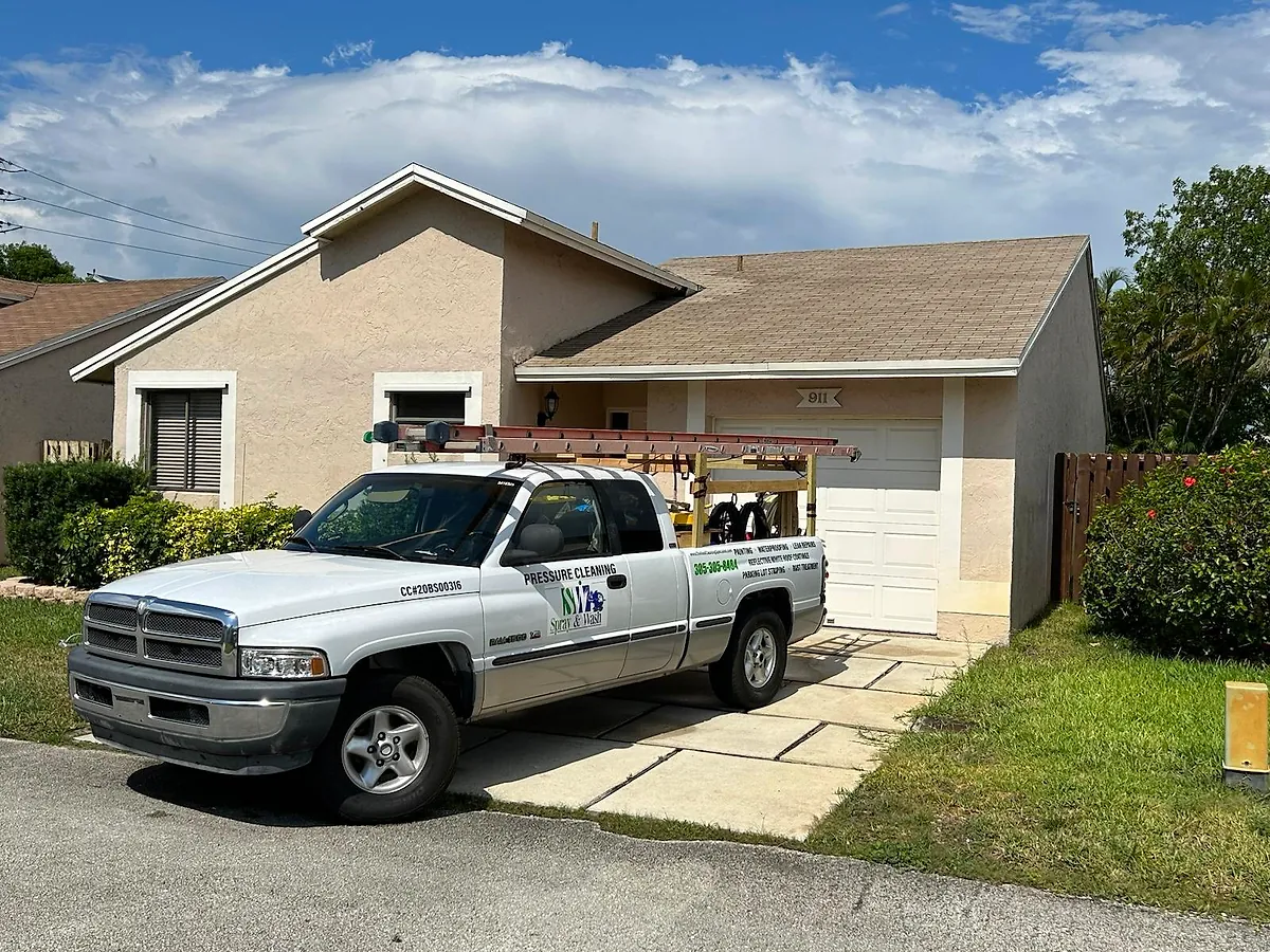 The Spray & Wash truck outside a finished job in South Florida
